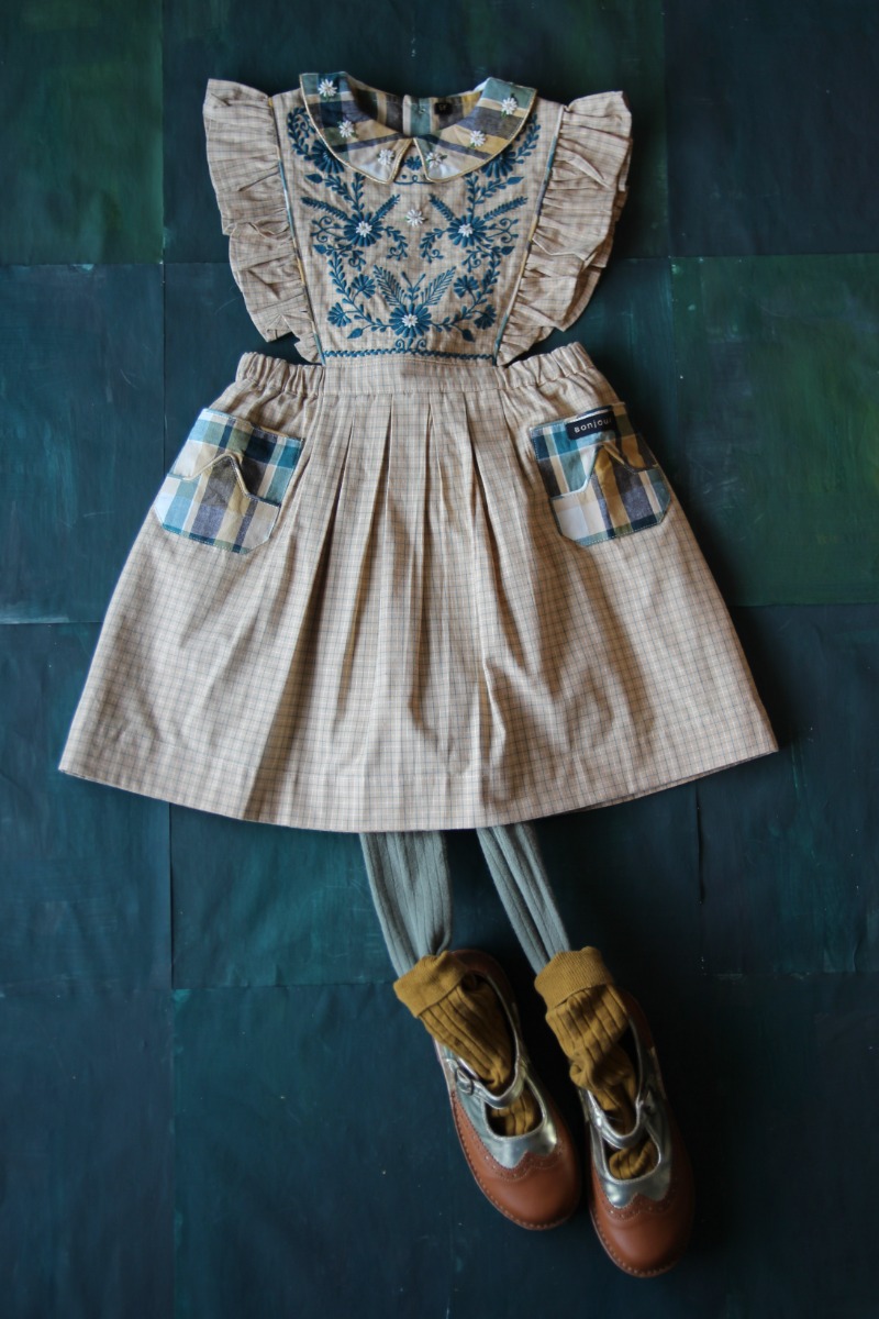 Apron dress with embroidery